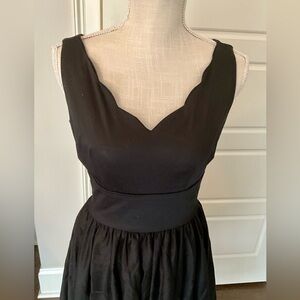 Elegant and Stylish Swing Black Sleeveless Midi Dress